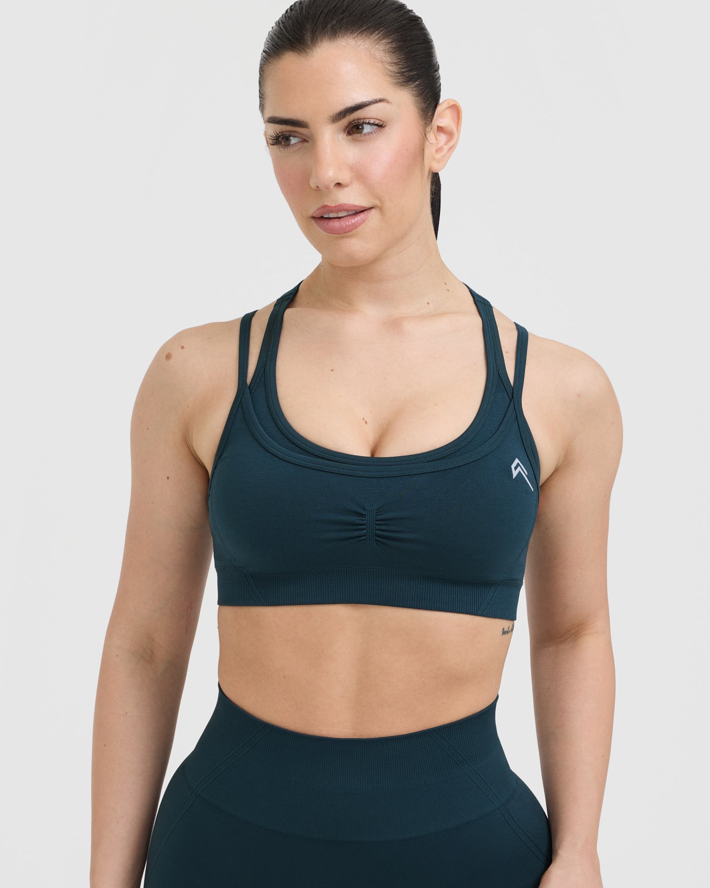 EffortlessLift Seamless Layered Sports Bra with White Logo | Oil Blue - Image 4