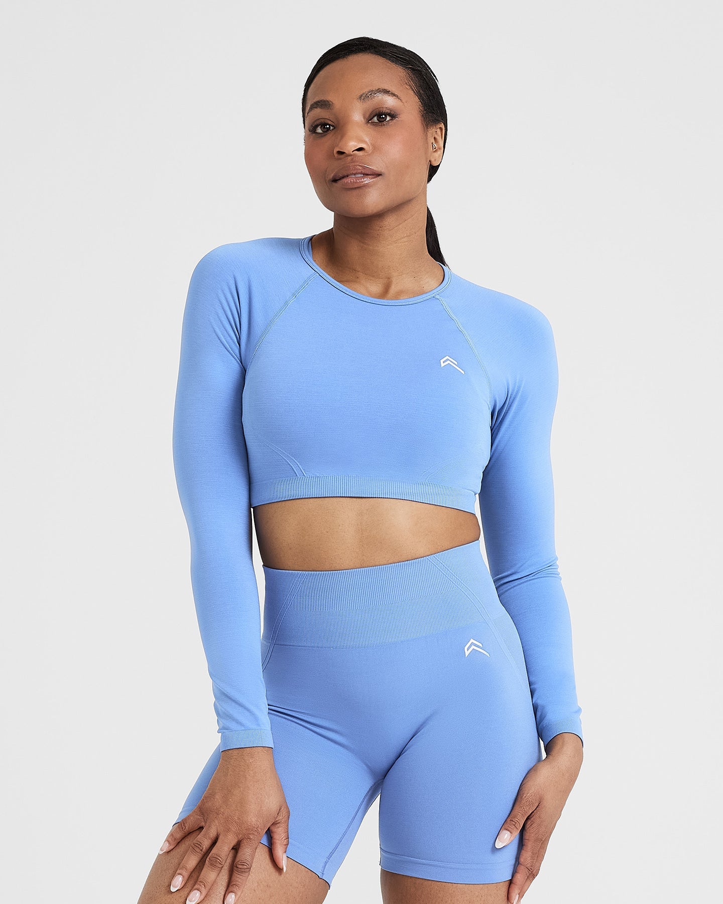 EffortlessLift Seamless Long Sleeve Crop Top with White Logo | Light Denim