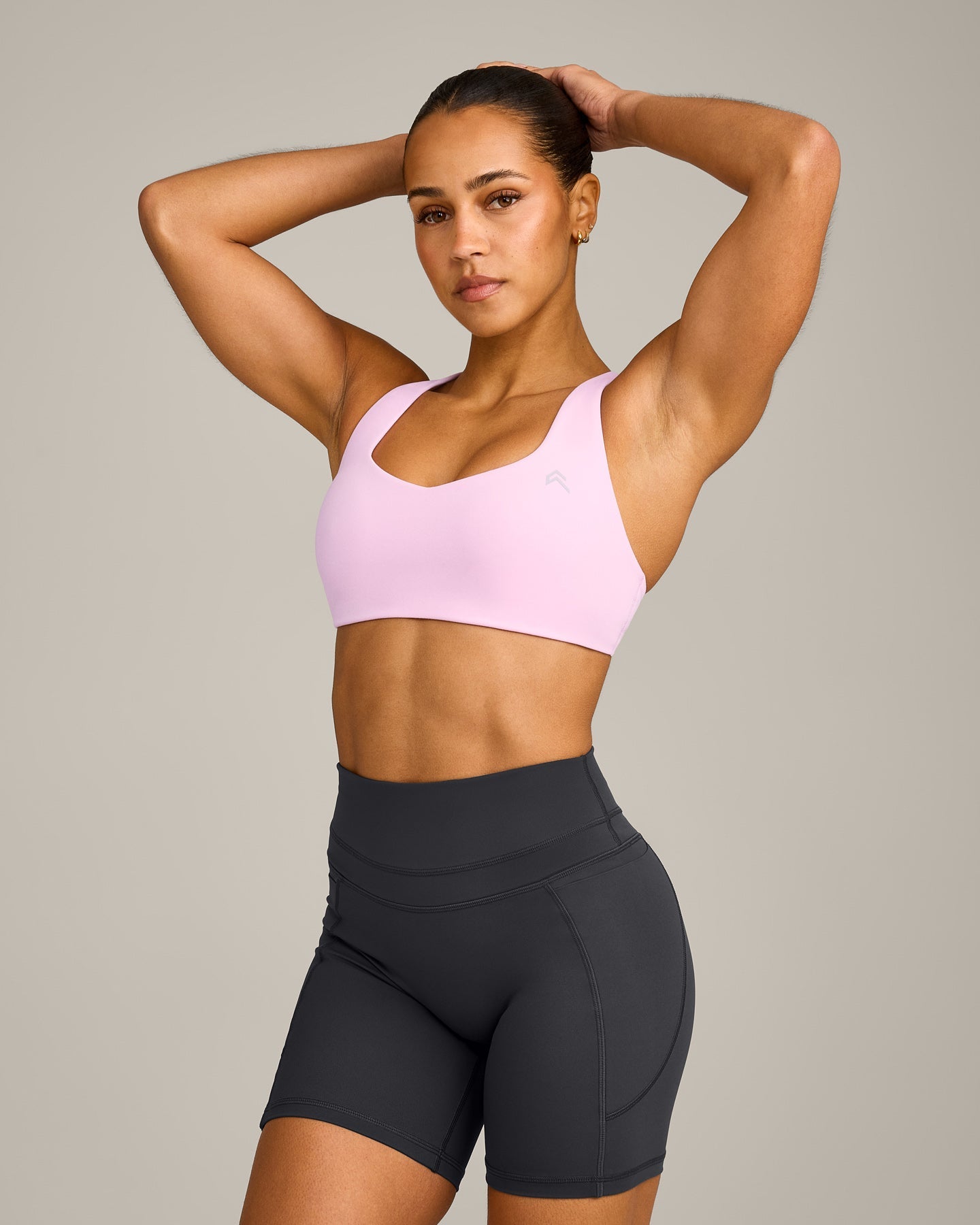 EasyLift Cross Back Sports Bra with Grey Logo | Chalk Pink