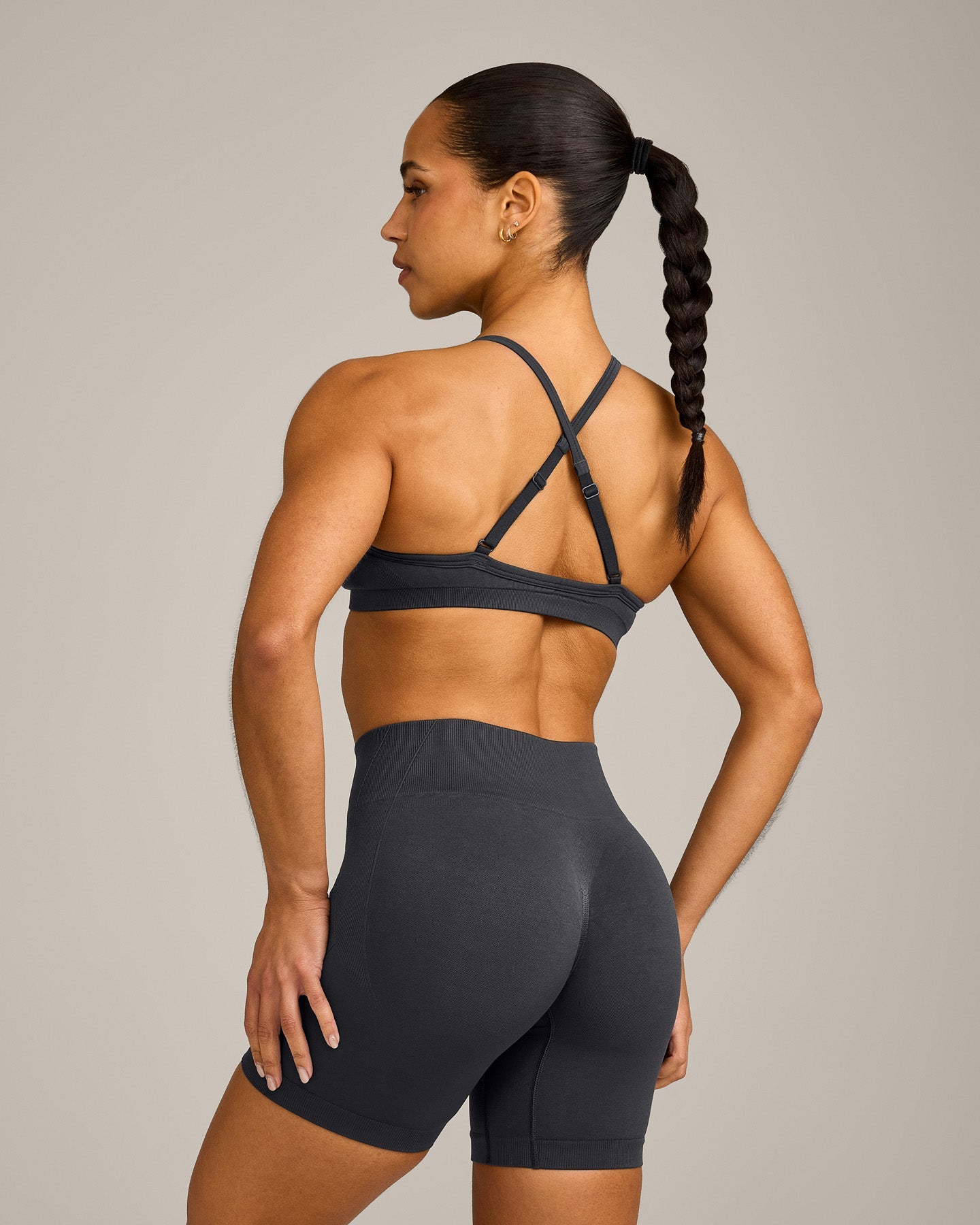 EnhanceLift Seamless Strappy Sports Bra with Grey Logo | Coal - Image 2