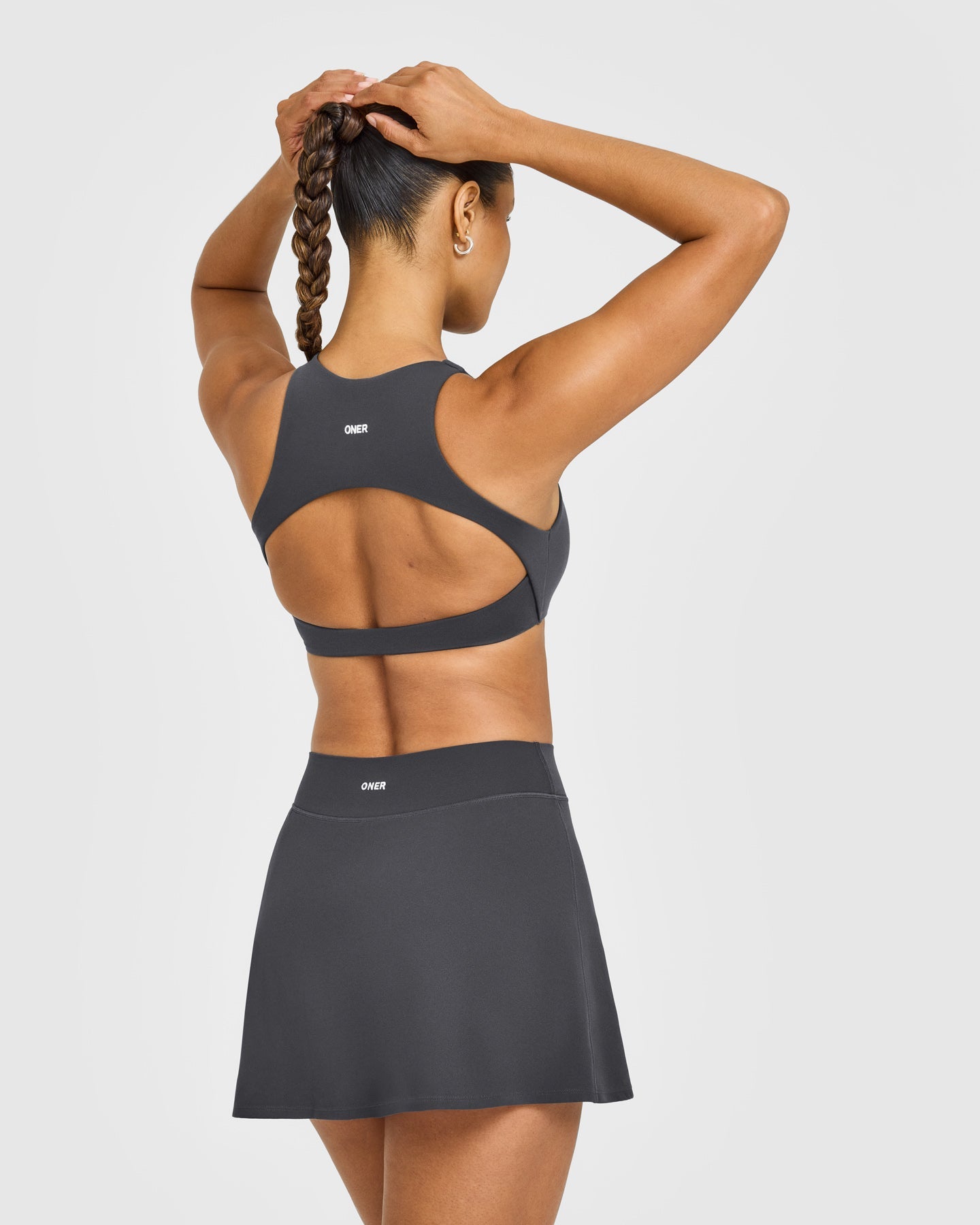 SoftMotion High Neck Sports Bra with White Logo | Coal - Image 2