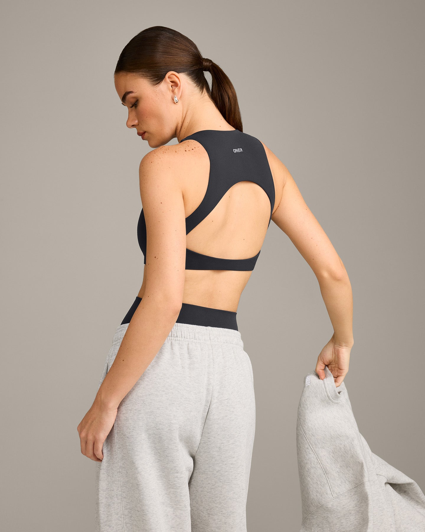 SoftMotion High Neck Sports Bra with Grey Logo | Coal - Image 2