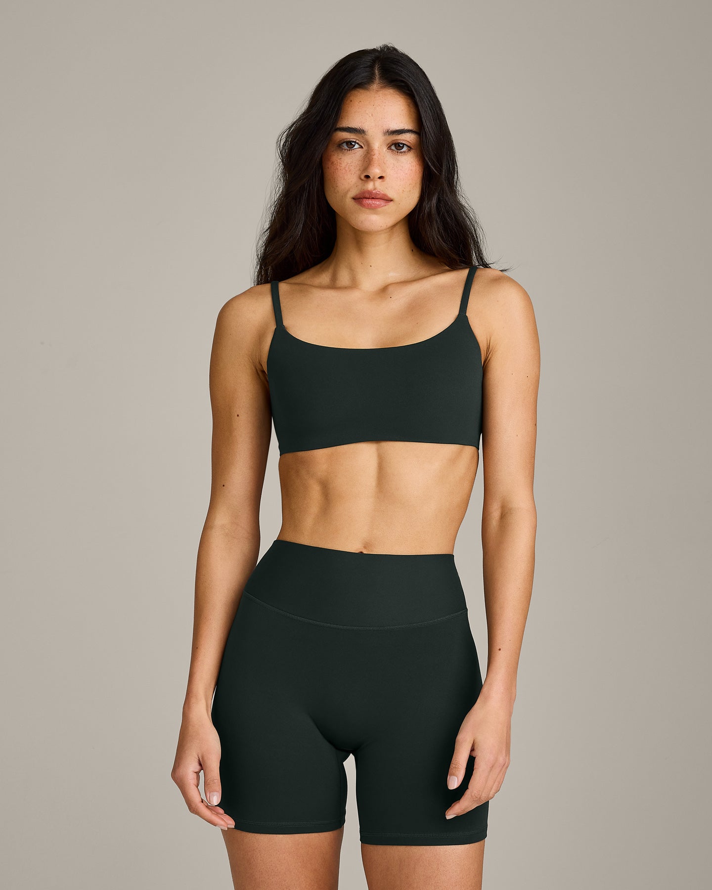 SoftMotion Strappy Sports Bra with Grey Logo | Emerald Noir
