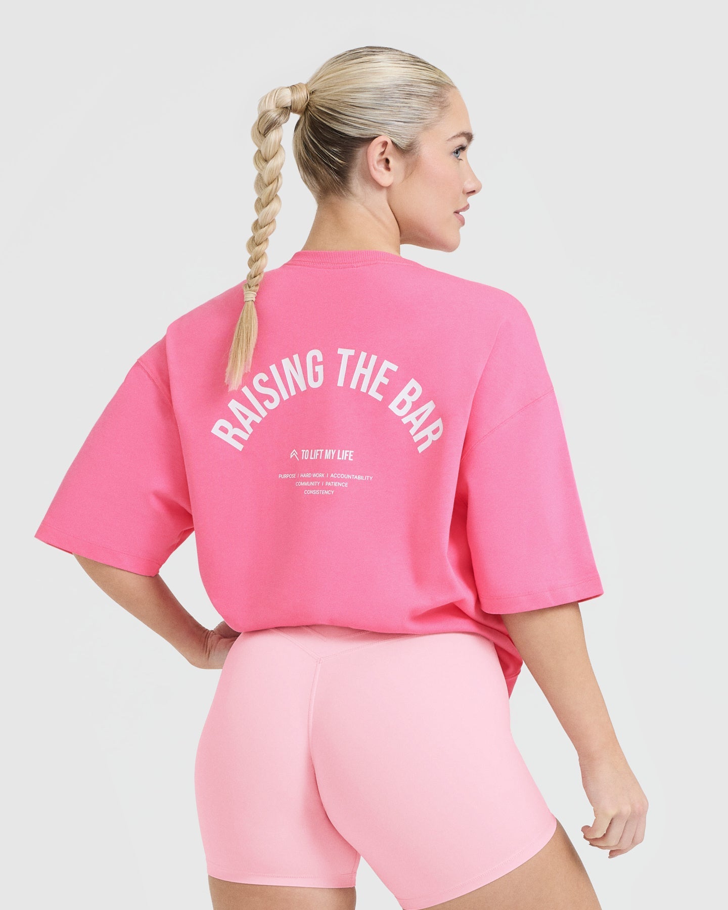 Raising The Bar Graphic Unisex T-Shirt | Peony Pink - Image 2